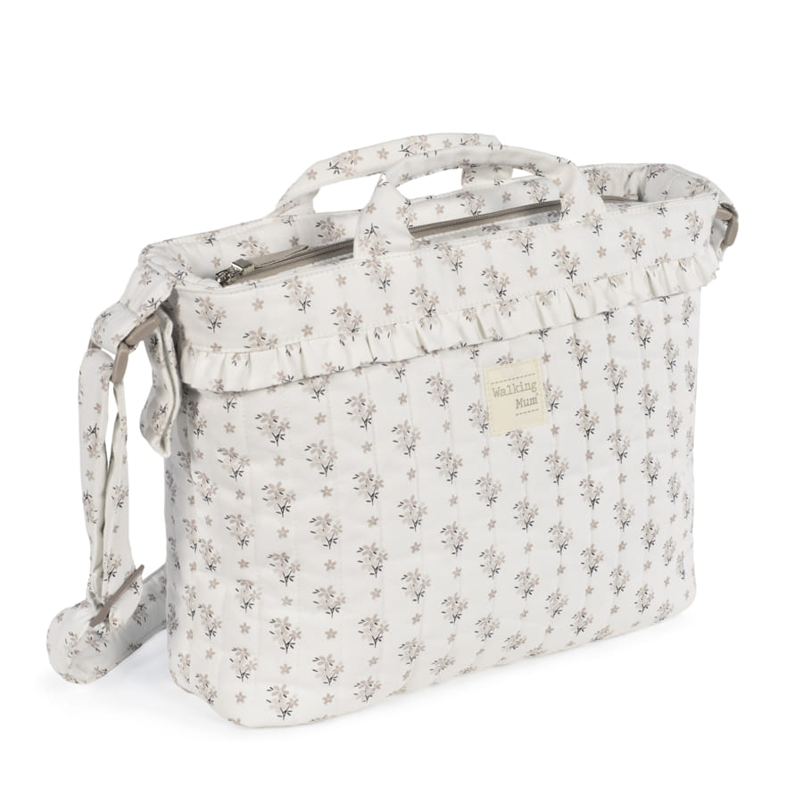 Sac à langer bébé Botton Fleurs accroché à la poussette