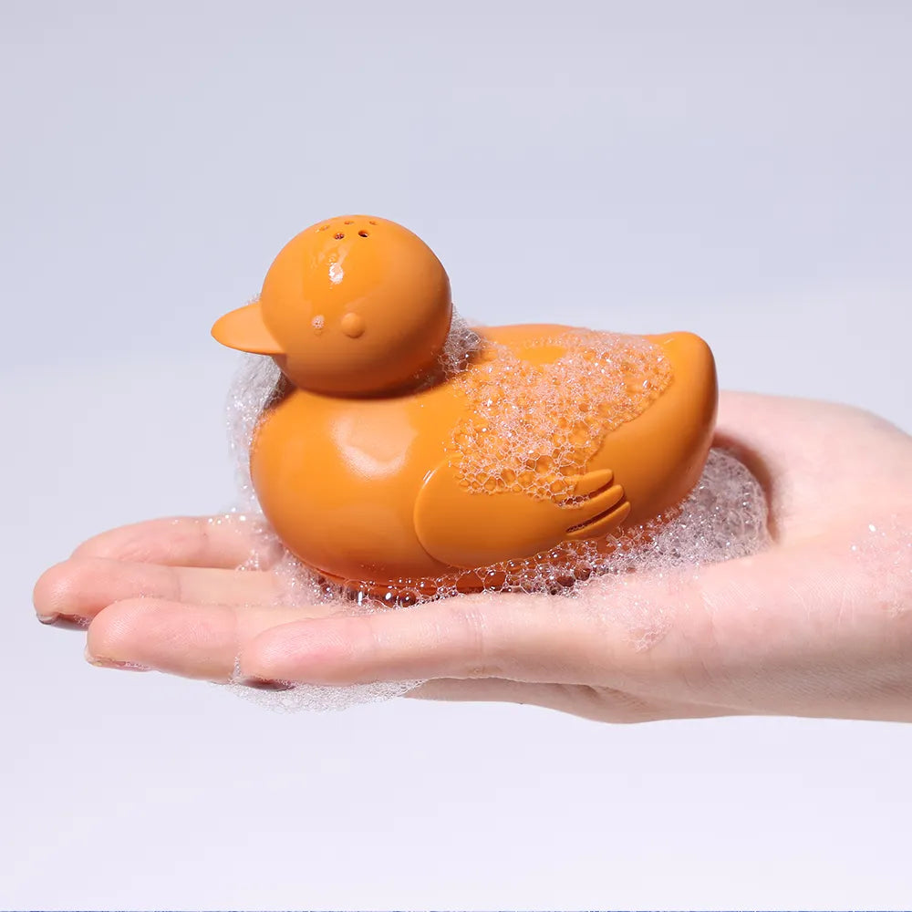 activité ludique bain enfant figurines flottantes canard