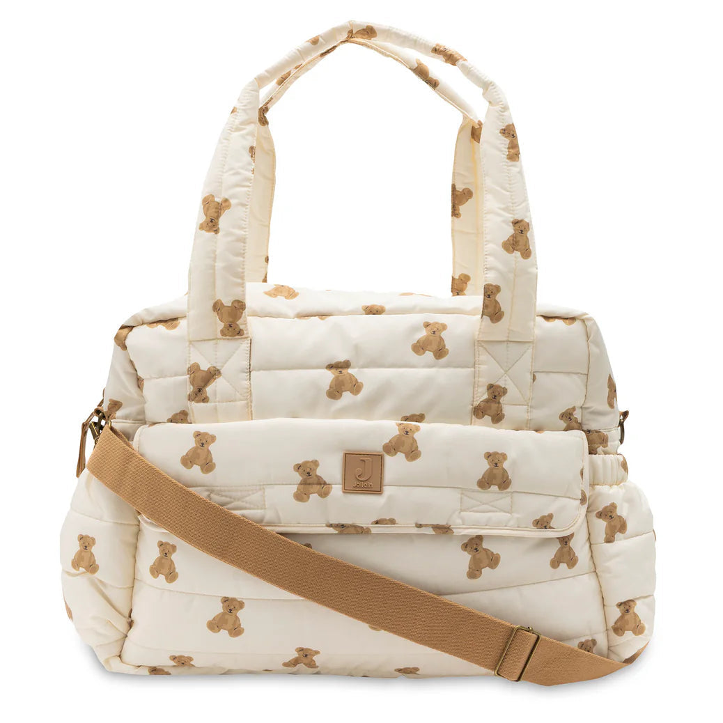 Sac à langer spacieux et déperlant avec tapis à langer nomade inclus. Pratique, élégant et idéal pour les sorties avec bébé.