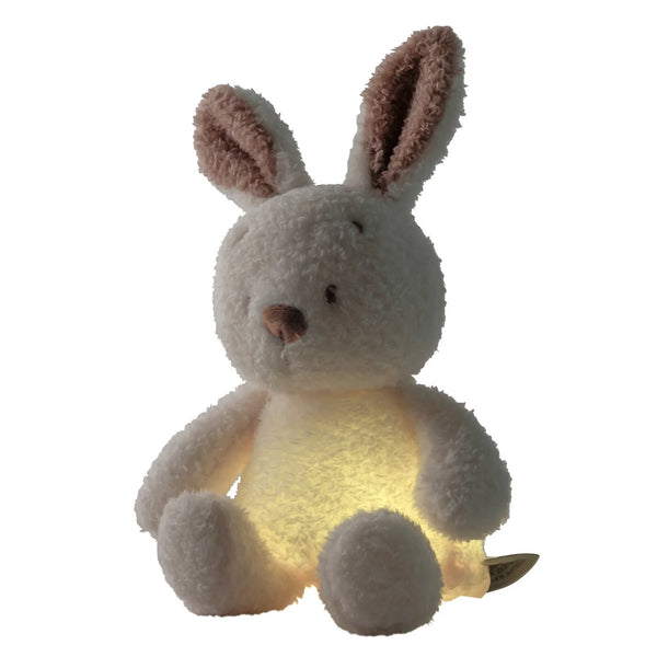 Veilleuse peluche lapin Teddy beige, douce et rassurante. Lumière à deux intensités, rechargeable USB et housse lavable. Parfaite pour apaiser bébé la nuit.